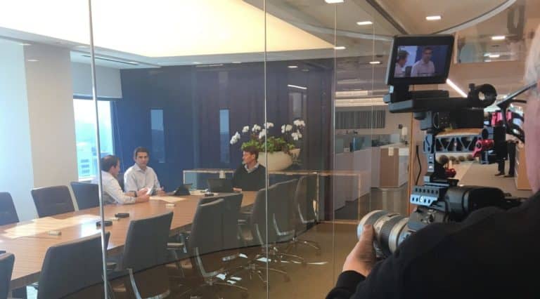 Shooting video of meeting in conference room